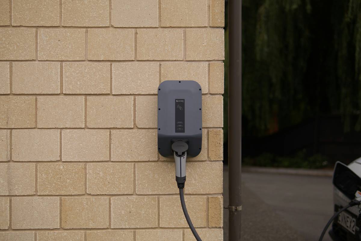 Comparison of smart outdoor wall outlet wiring diagram showing proper grounding and conduit use