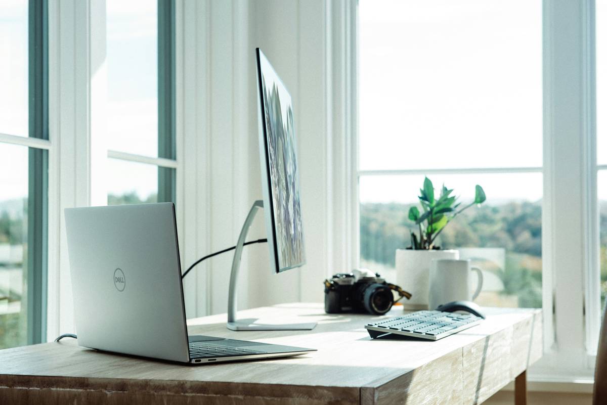 Modern foldable smart table mounted on wall in compact urban apartment