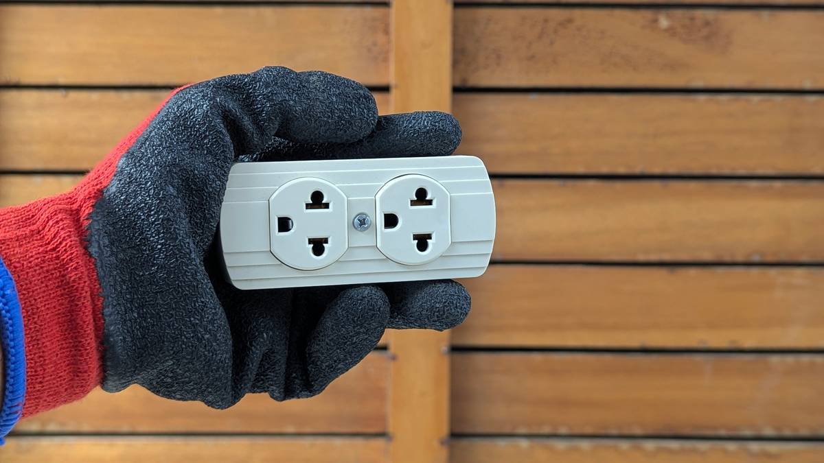 how to make a smart outlet - wiring diagram showing microcontroller connected to outlet housing with safety labels